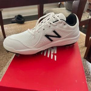 Men’s New Balance metal cleats